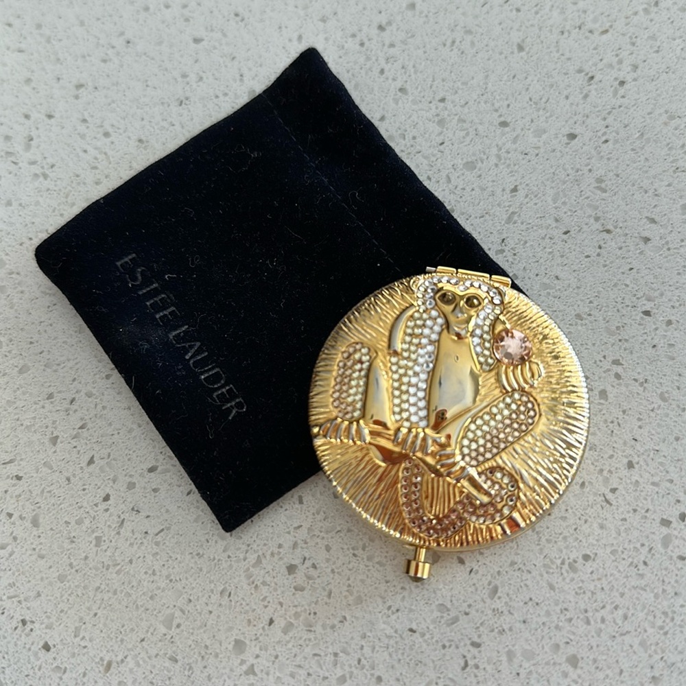 Estée Lauder collectible mini compact, Chinese Zodiac, year of the monkey. Gold.